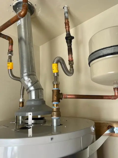 Water heater installation and plumbing repair in Melba
